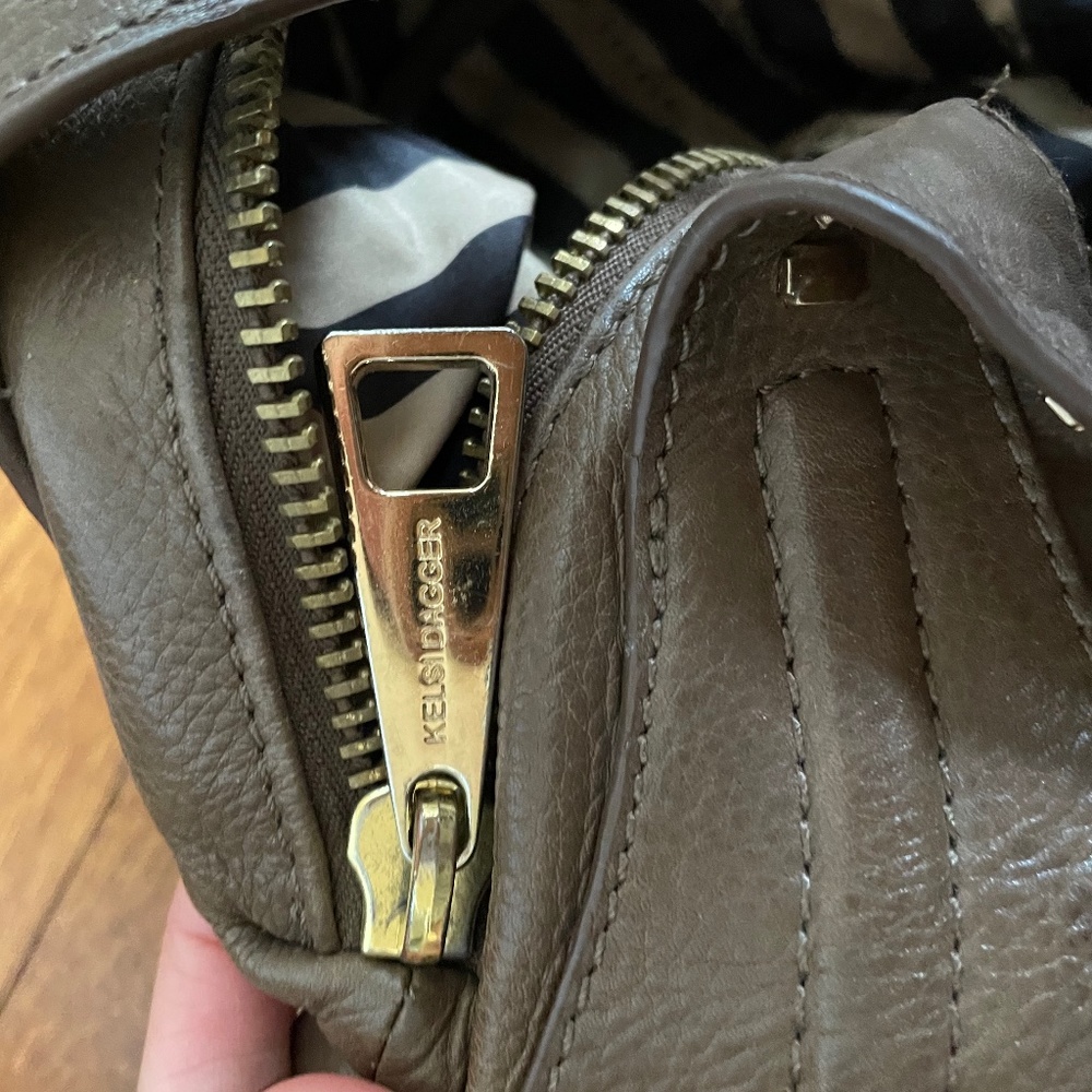 Kelsey dagger slouch cross body or handheld bag